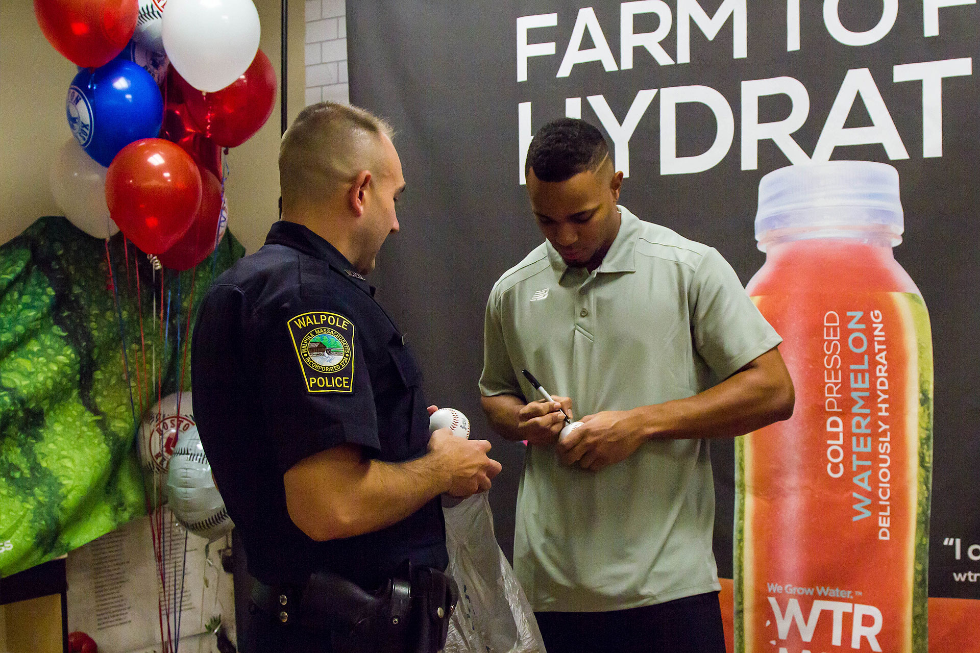 Xander Boegarts Signs Baseball for Fan for WTRMLN WTR at Stop N Shop Appearance